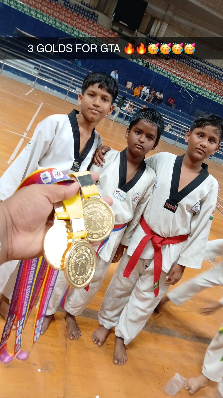 Ganghan students holding gold medals at a state Taekwondo championship